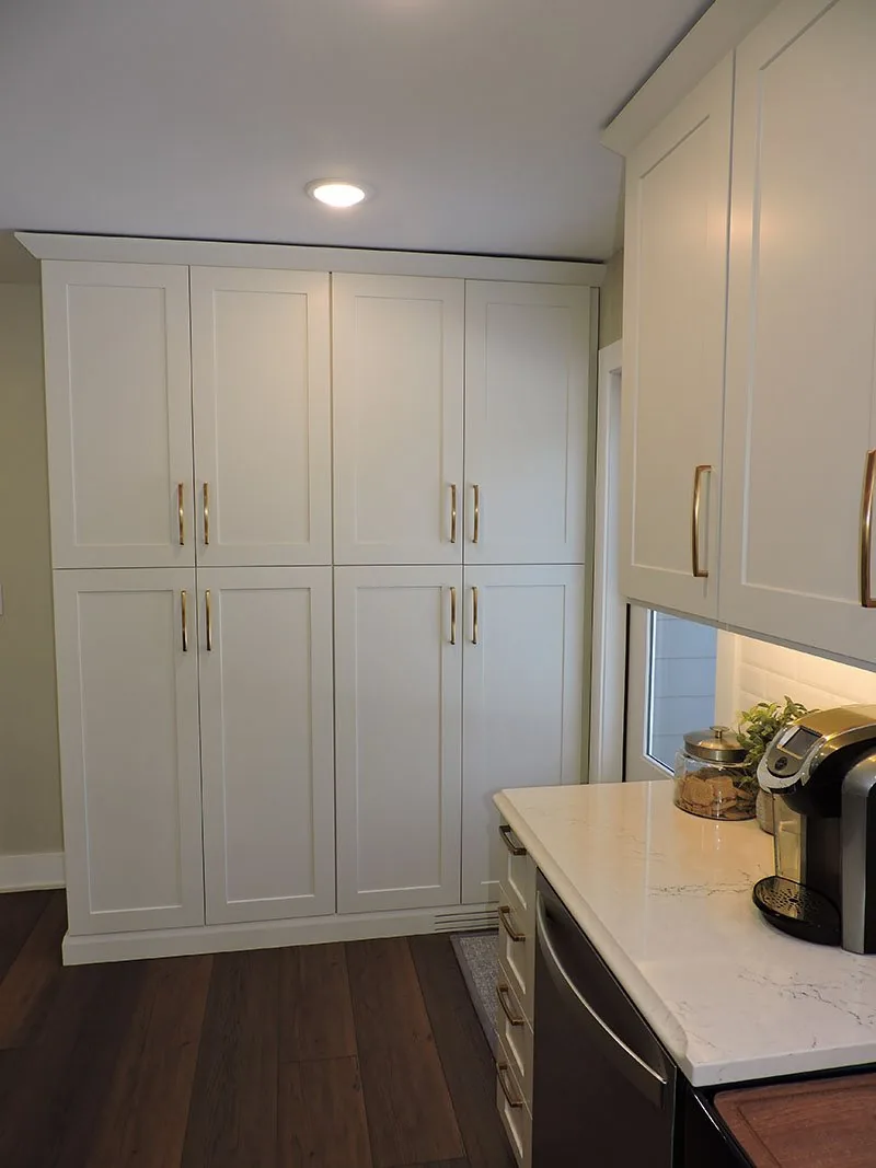 Tall cabinetry and pantry storage in the Ada house