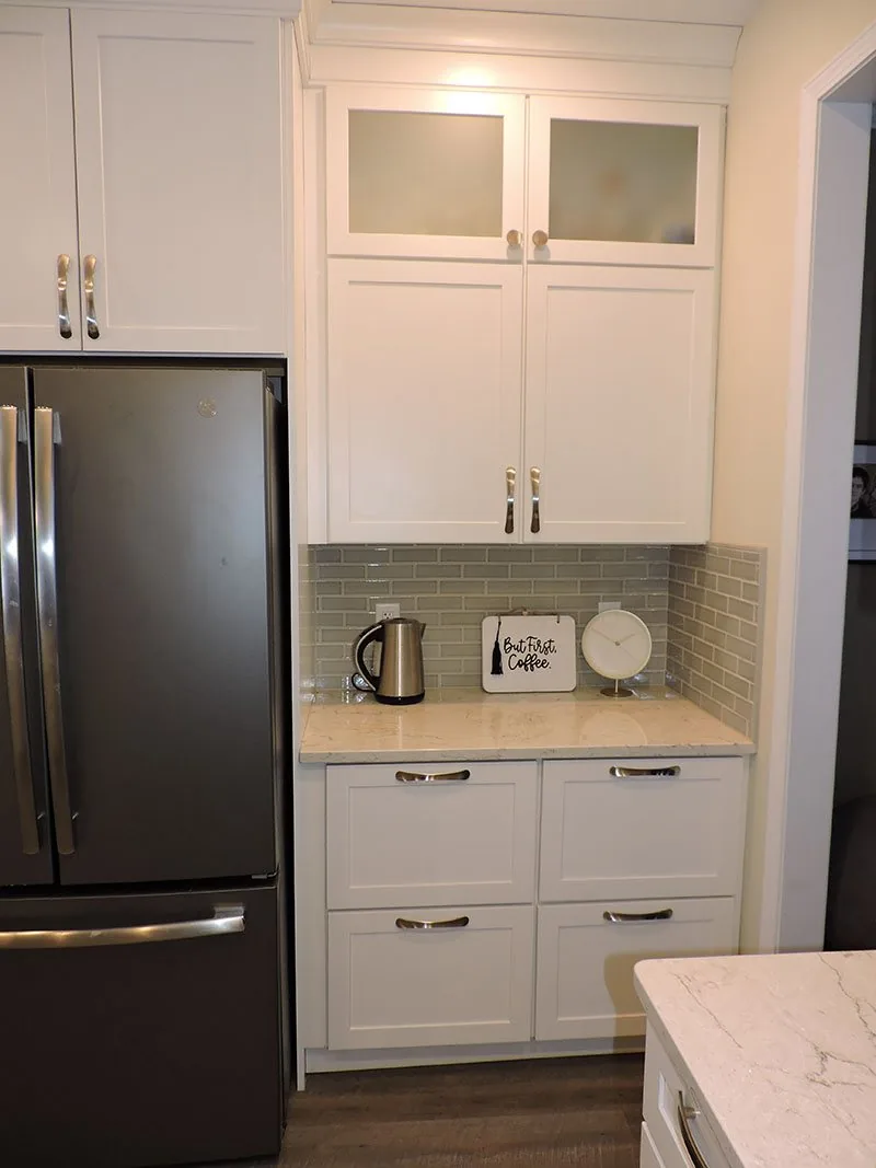 Upper cabinets and glass fronts in the Caledonia kitchen